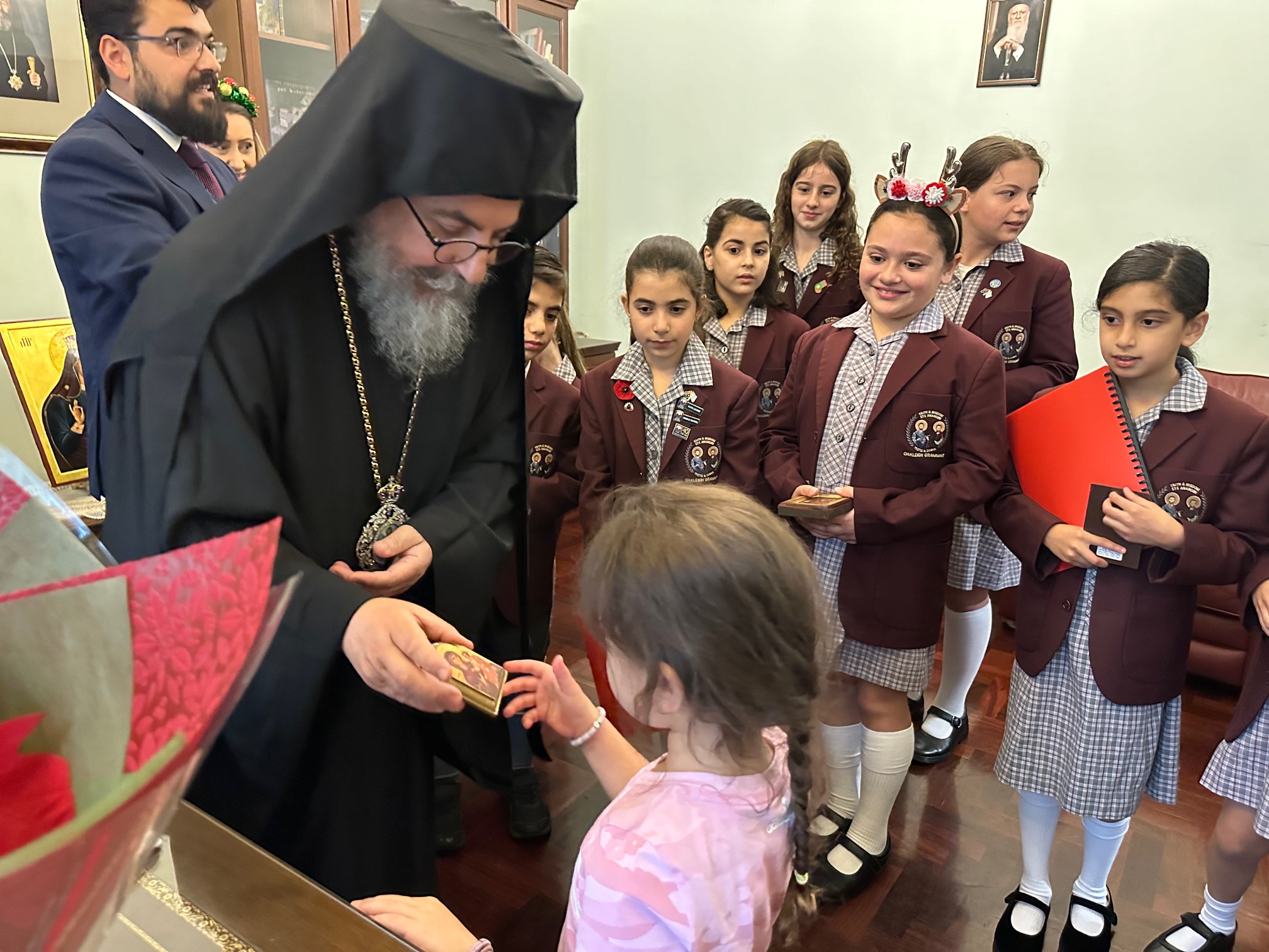 Students from Oakleigh Grammar sang traditional carols from Chios for Bishop Kyriakos of Sozopolis