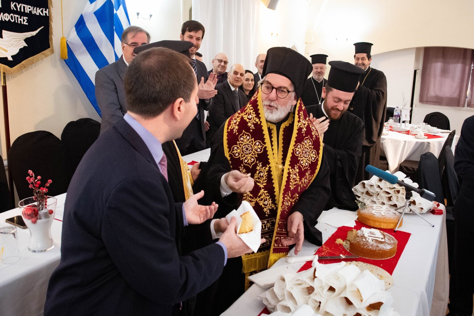 Archbishop of Thyateira and Great Britain cuts Vasilopita at Greek Cypriot Brotherhood, in North London